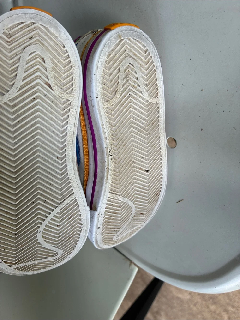 Nike Kids White Sneakers with Purple Lining and Blue Accent